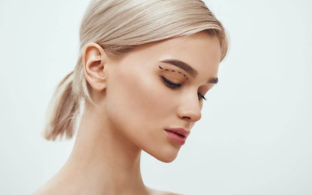 blonde woman with sketch on her face