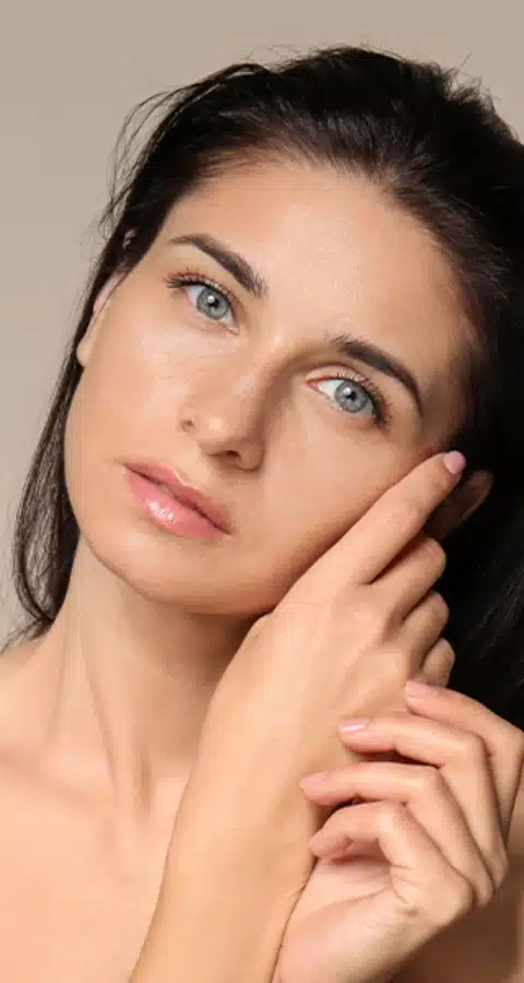 portrait of beautiful young woman with natural makeup ()